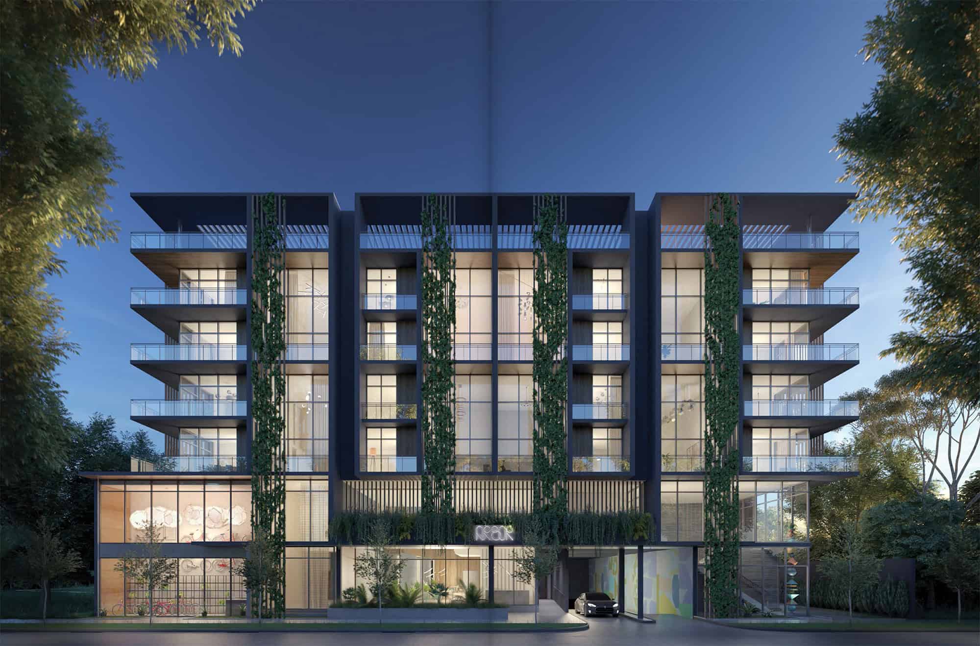 Exterior of Arbor Coconut Grove showing eco-friendly design and lush landscaping