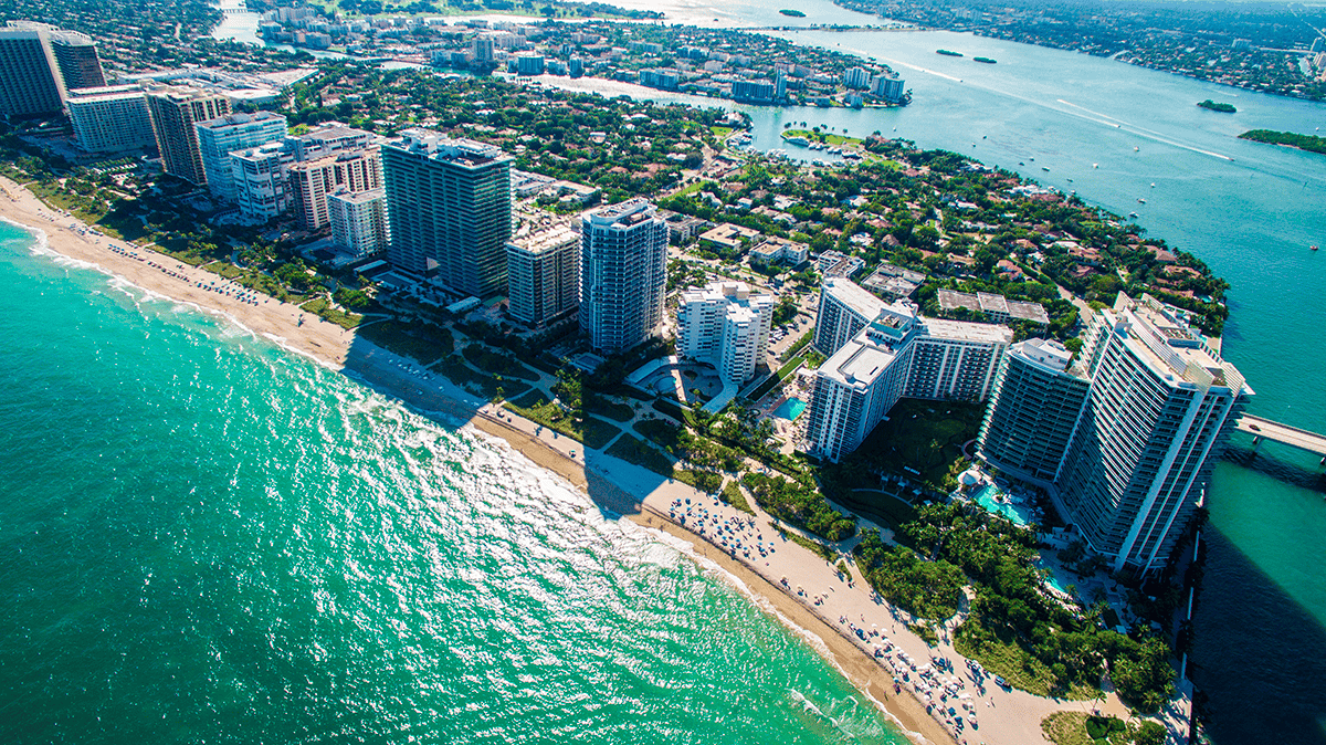 Aerial view of Bal Harbour beachfront, a prime location for Miami billionaire real estate.