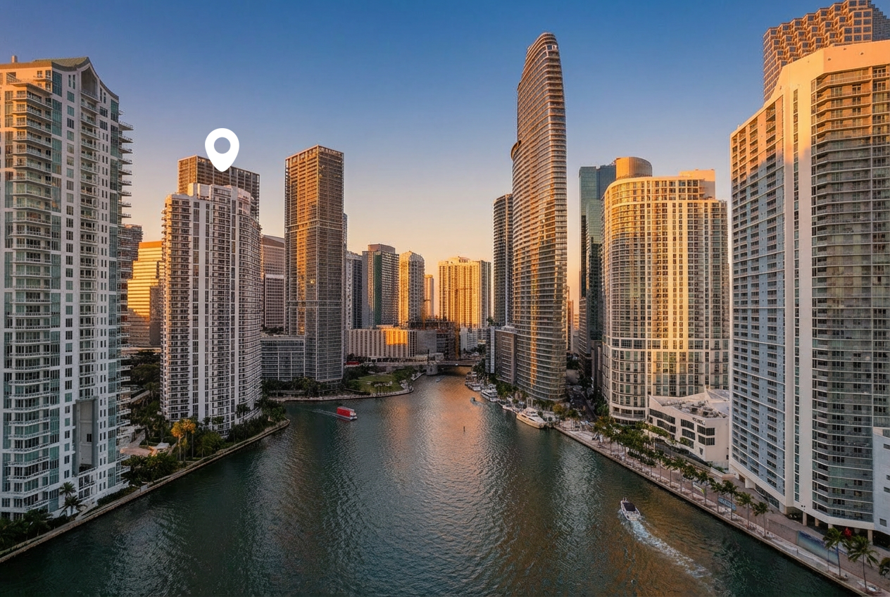 Carbonell unit 1009 waterfront condo highlighted in Brickell Key Miami skyline at sunset