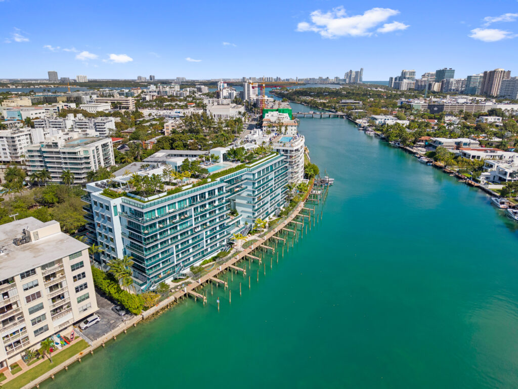 Aerial view of Bay Harbor Islands with luxury waterfront condos and turquoise water near Miami Beach