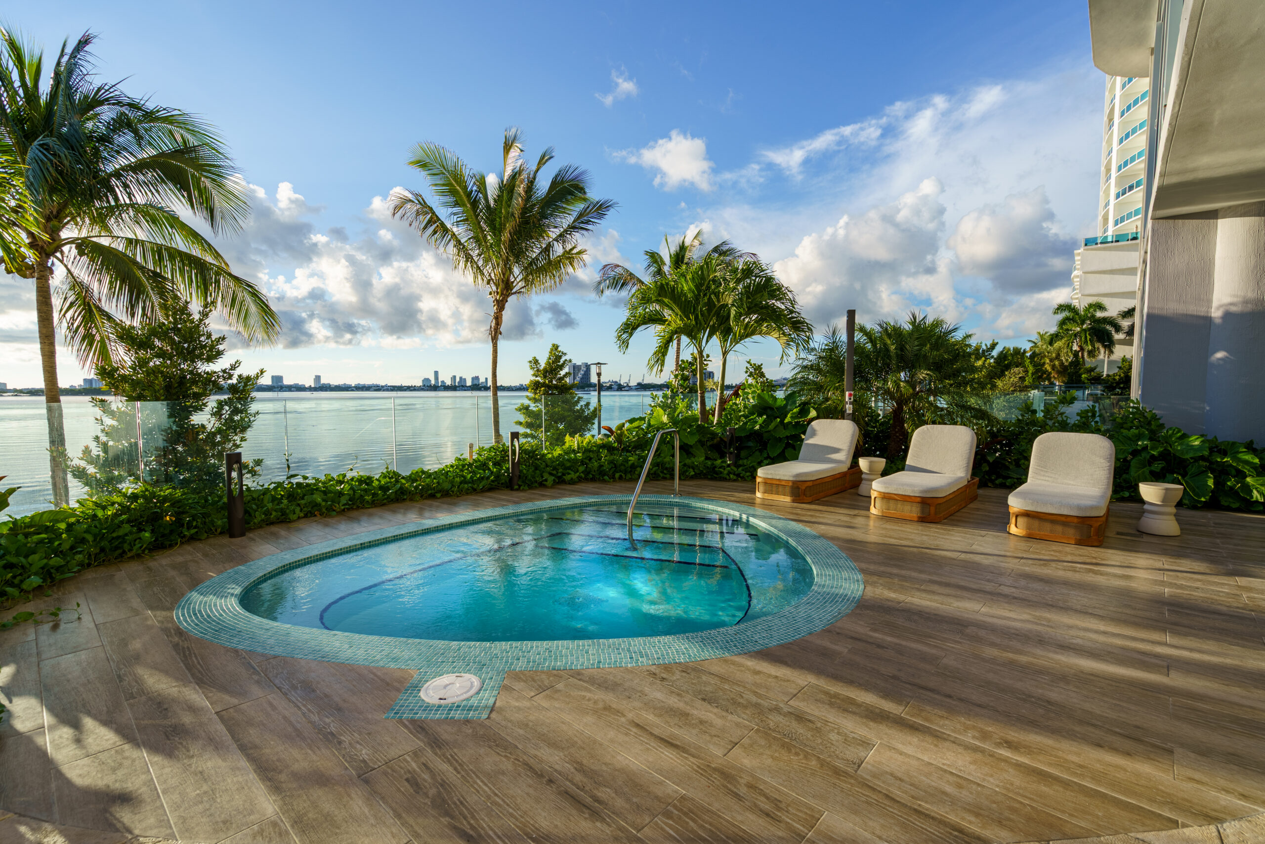 Aria Reserve Miami Unit 5206 bayfront plunge pool with lounge chairs
