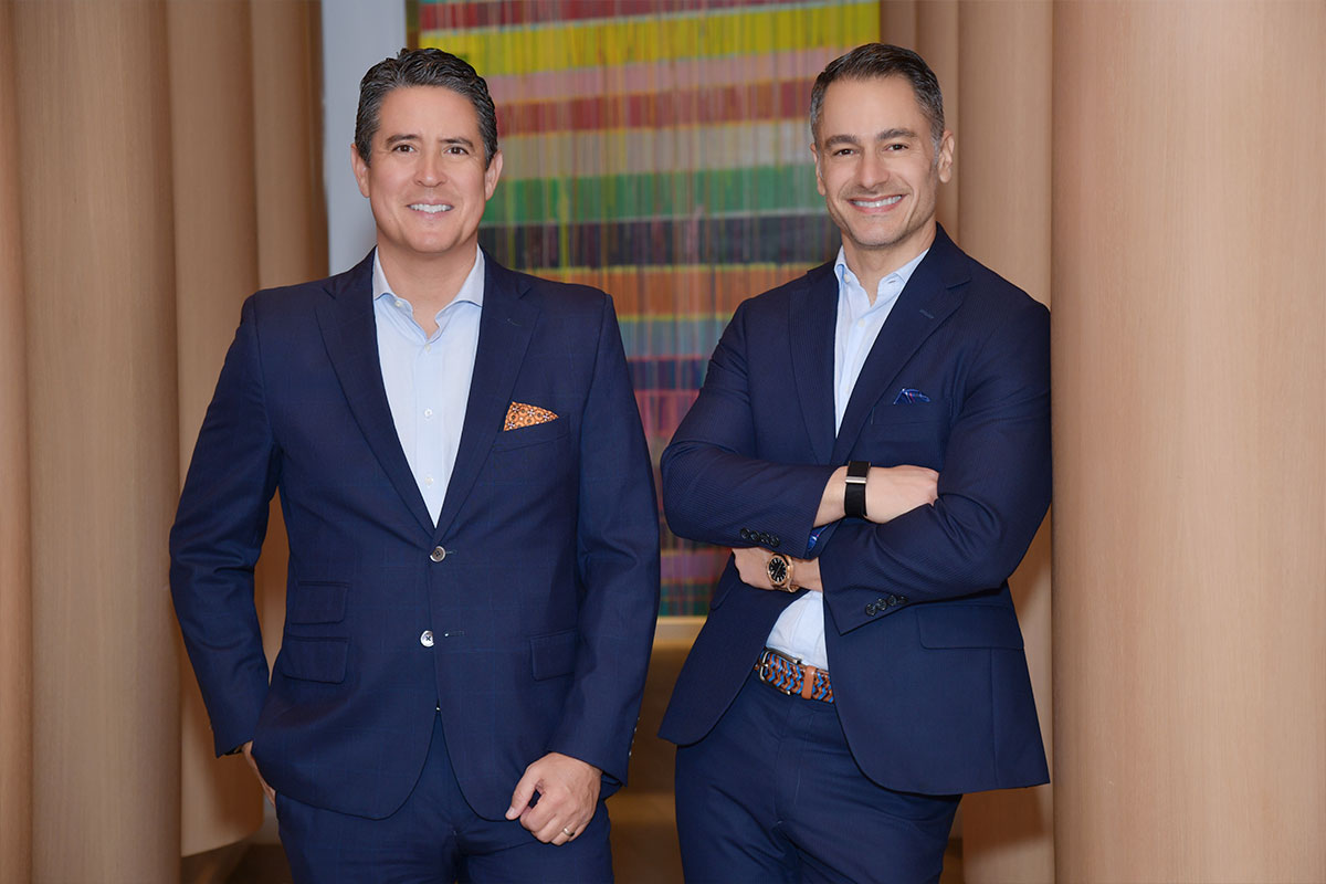 How have Ivan & Mike proven themselves as top real estate agents in Miami