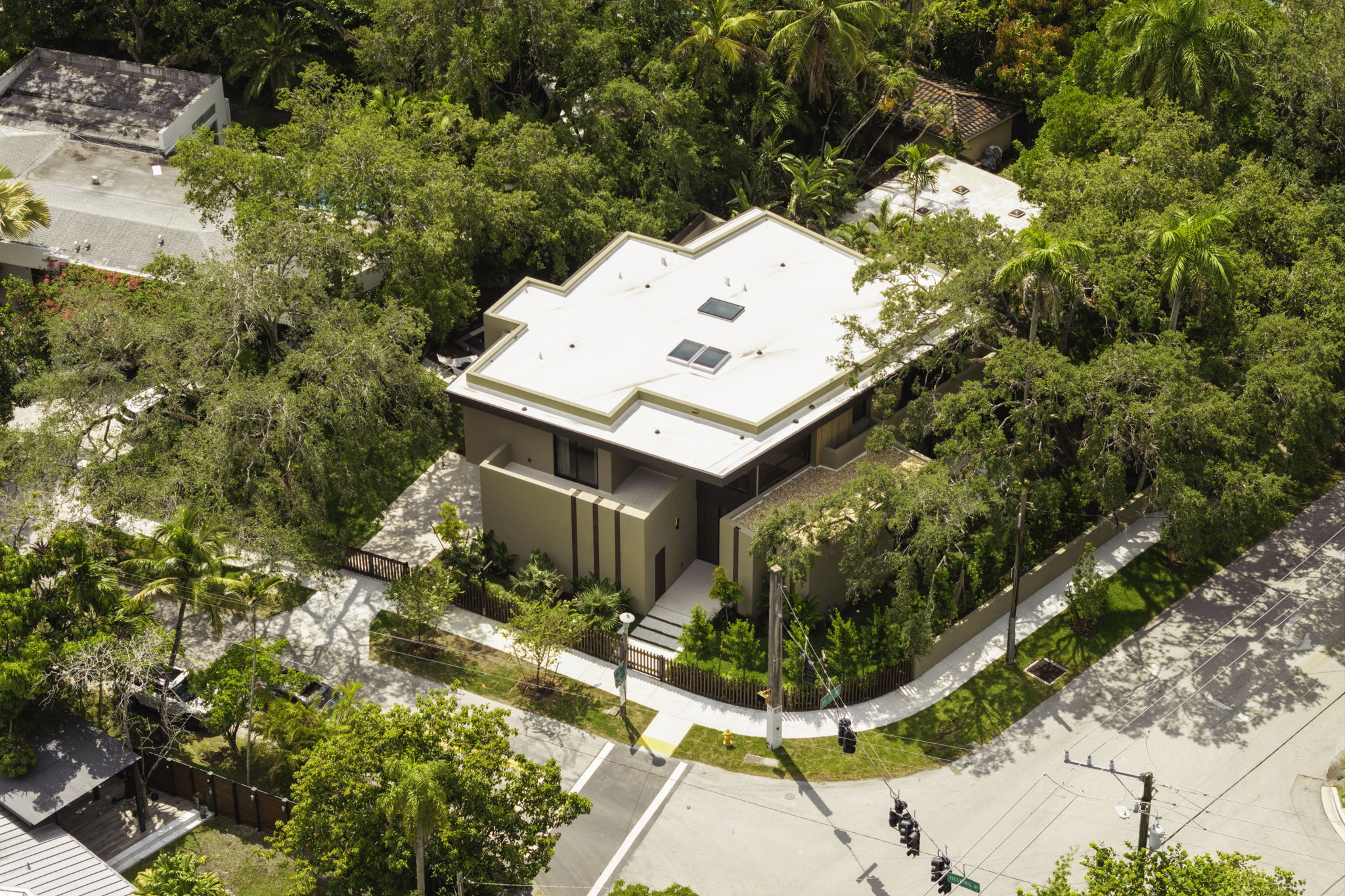 1698 Tigertail Avenue - Peacock house